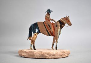 An American Enamelled Fretwork Silhouette of Mounted Cowboy, Stone Plinth, 17cms Wide
