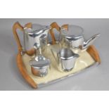 A Picquot Ware Five Piece Service to comprise Tray, Sugar Bowl, Teapot, Hot Water Pot, Milk Jug
