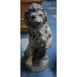 A Resin Garden Ornament, snarling seated Lion