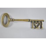 A Large and Heavy Brass Key to Celebrate 21st Birthday, 34cms long