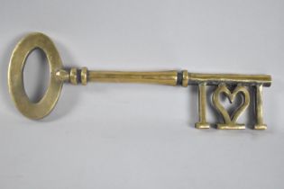 A Large and Heavy Brass Key to Celebrate 21st Birthday, 34cms long