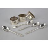 A Collection of Various Silver to Comprise Three Napkin Ring and Set of Four Teaspoons, Various