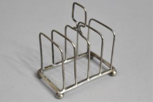 A Silver Four Division Toast Rack by William Hutton & Sons Ltd, 7cm wide