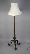 An Early 20th Century Brass Standard Lamp on Tripod Stand with Bun Feet, Complete with Bell Shaped