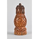 A Mid 19th Century Carved Coquilla Nut Pounce Pot or Spice Sprinkler in Three Parts Formed from