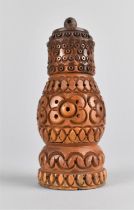 A Mid 19th Century Carved Coquilla Nut Pounce Pot or Spice Sprinkler in Three Parts Formed from