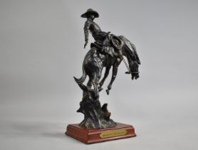 A Western Moments Resin Figure of Cowboy Breaking Horse, "Breakin' Out The Bad Ones", 33cms High