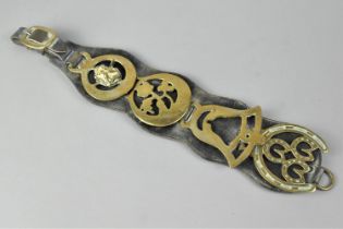 A Vintage Leather Martingale Strap Containing Four Horse Brasses, 45cms Long