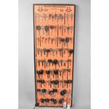 A Vintage Wall Hanging Motor Dealer's Blank Key Display Rack Containing Blanks by Davenport Burgess,