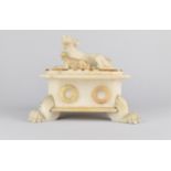 A Late Victorian Alabaster Trinket Box, the Canted Lid with Sporting Dog Mounts, Four Claw Feet,