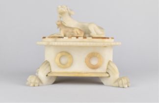 A Late Victorian Alabaster Trinket Box, the Canted Lid with Sporting Dog Mounts, Four Claw Feet,