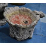 A Reconstituted Stone Garden Birdbath of Tree Trunk Form, 34cm Diameter and 27cms High