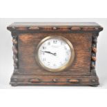 An Edwardian Oak Mantel Clock with Barley Twist Pilasters, 23.5cms Wide