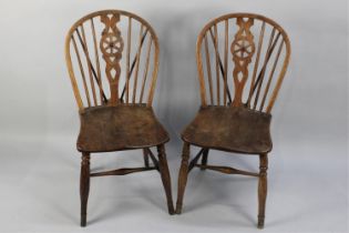 A Pair of Elm Seated Wheel and Spindle Back Side Chairs