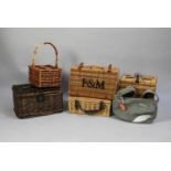 A Collection of Five Modern Wicker Picnic Hampers and a Wicker Four Bottle Carrier