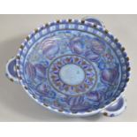 A 1930's Crown Ducal Blue Tulips or Kashmir Tube Lined Three Handled Bowl Designed by Charlotte