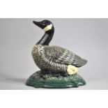 A Modern Cast Iron Cold Painted Doorstop in the Form of a Canada Goose, 21cms Long
