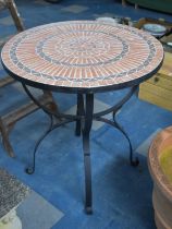 A Garden Patio Table with Mosaic Top