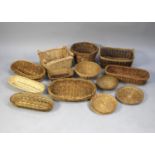 A Collection of Modern Wicker Trays and Baskets of Various Shapes and Sizes