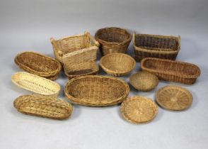 A Collection of Modern Wicker Trays and Baskets of Various Shapes and Sizes