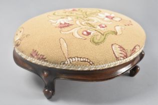 A Mahogany Framed Oval Footstool with Tapestry Upholstered Top, 33cms Wide