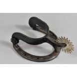 A Novelty American Door Knocker in the Form of a Horseshoe and Riding Spur, 18cms High