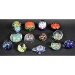 A Collection of Various Glass Paperweights to comprise Floral and Lacework Examples
