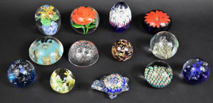 A Collection of Various Glass Paperweights to comprise Floral and Lacework Examples