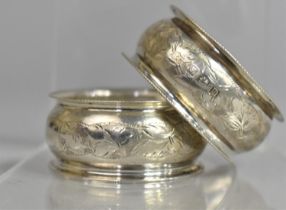 A Pair of Silver Napkin Rings with Floral Decoration by J&C, Birmingham 1911