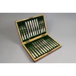 An Early 20th Century Cased Canteen of Twelve Silver Plated Fruit Knives and Forks with Mother Pearl