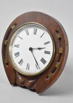 A Novelty Desk Top Mantel Clock in the Form of a Horseshoe, 14cms High, Complete with Key