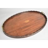 A George III Inlaid Mahogany Oval Tray with Wavy Gallery and Two Brass Side Handles, Conch Shell