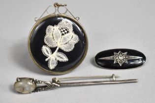 Three Silver Items, Two Brooches, One Scottish with Agate Jewel, a Silver Loon Containing Two