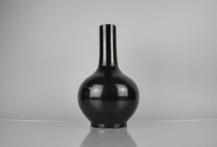 A Chinese Porcelain Monochrome Bottle Vase, Black Glaze, Having Blue Six Character Mark to Base