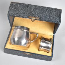 A WMF Christening Set, Date Letter G with Ostrich, Napkin and Tankard