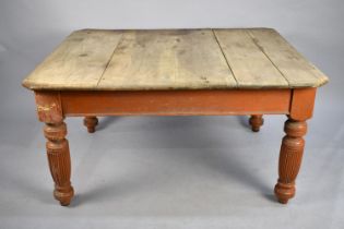 A 19th Century Pine Four Plank Scrub Top Scullery Table with Canted Edges on Turned Painted Reeded