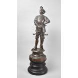 A Bronzed Spelter Figure of a Medieval Soldier with Crossbow on Double Turned Socle, 48cms High