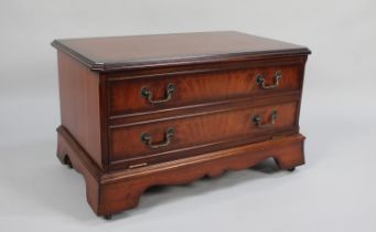 A Mahogany TV/DVD Stand with Pull Down Front in the Form of Two Long Drawers, 73cms Wide