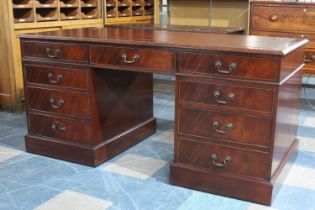 A Reproduction Mahogany Kneehole Desk with Red Leather Effect Top, Pull Down Keyboard Centre and Two