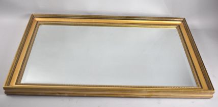 A Modern Rectangular Gilt Framed Bevelled Edge Wall Mirror, 72x47cms
