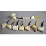 A Collection of Various Reproduction Meerschaum Type Pipes and Pipe Bowls