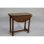 A Small Mid 20th Century Oak Drop Leaf Table, 53cms Wide