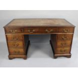 A Mid/Late 20th Century Keehole Desk with Centre Long Drawer Flanked by Two Short Drawers Either