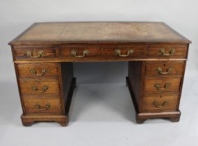 A Mid/Late 20th Century Keehole Desk with Centre Long Drawer Flanked by Two Short Drawers Either