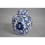 A Modern Blue and White Ginger Jar and Cover Decorated in a Floral Motif