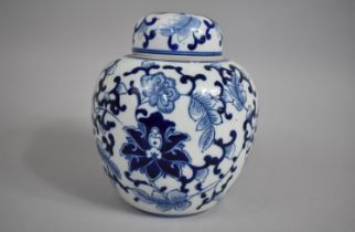 A Modern Blue and White Ginger Jar and Cover Decorated in a Floral Motif