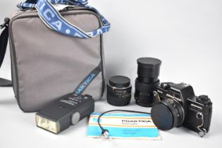 A Praktica DCA Electronic 35mm Camera Set with Lenses and Accessories in Canvas Carrying Bag