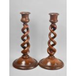 A Good Quality Matched Pair of Open Spiral Candlesticks with Weighted Bases, 26cms High