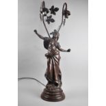 A Reproduction Spelter Two Branch Figural Table Lamp, 76cms High
