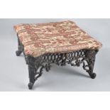 A Cast Iron Based Square Footstool with Upholstered Top, Scrolled Feet, 37cms Square